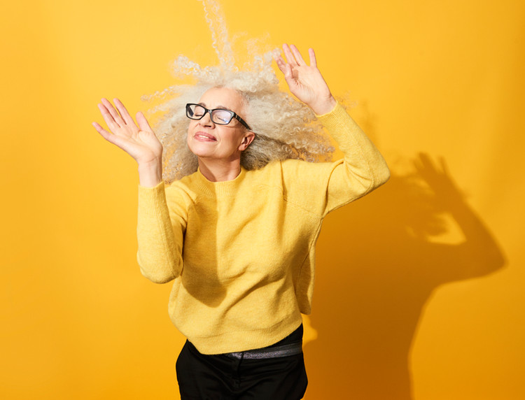An older woman dancing